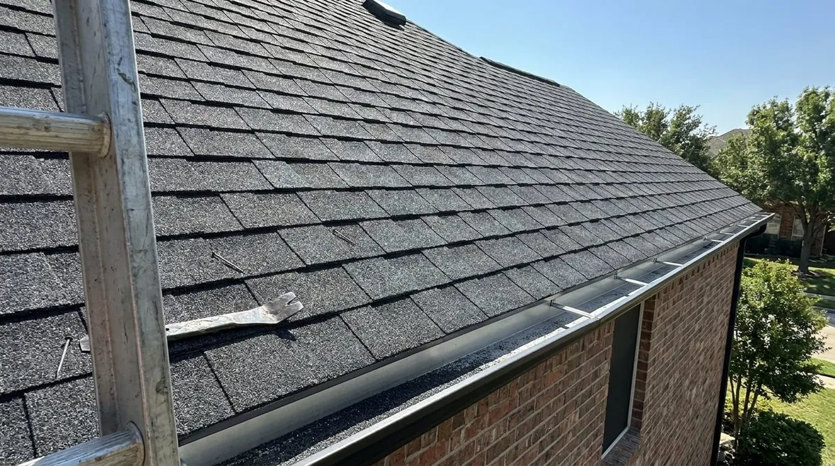 Max Def Moire Black architectural shingle installation in progress on a two-story North Texas home