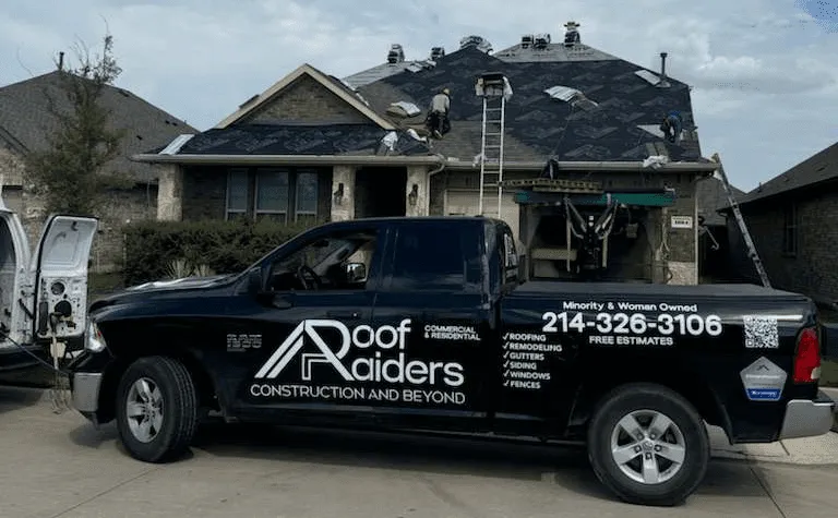 Roof Raiders branded truck at a local DFW jobsite