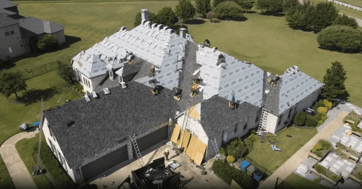 Drone aerial of a Roof Raiders re-roof on a North Texas estate