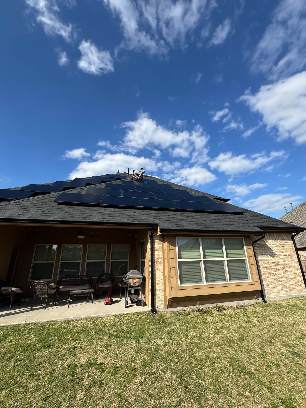 Black-on-Black Solar Array Over New Shingles, North Texas