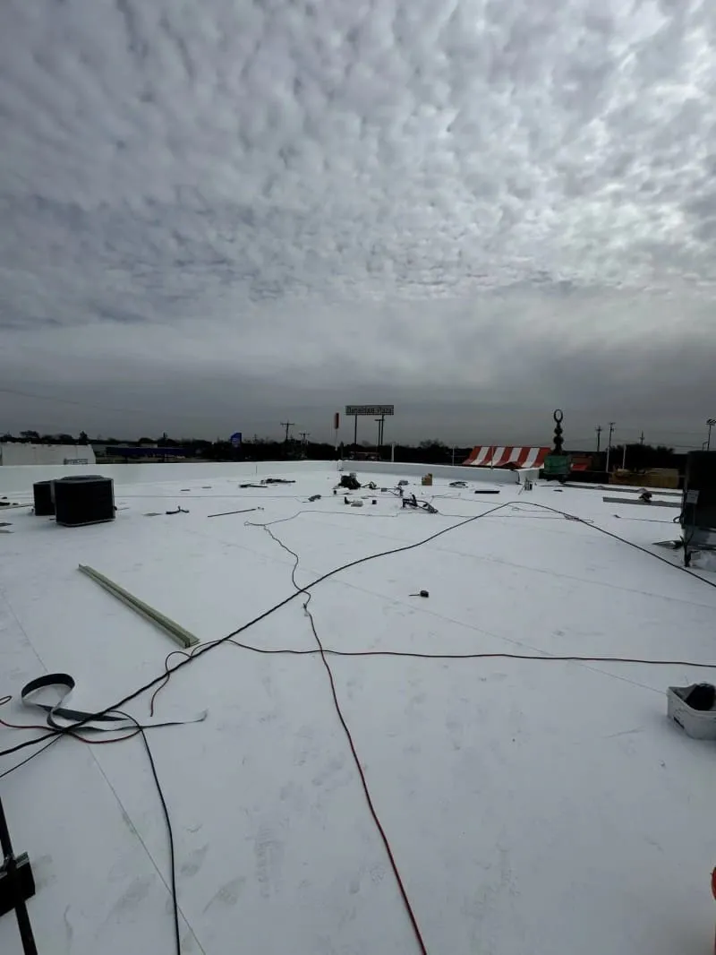 TPO flat roof install by Roof Raiders in Duncanville